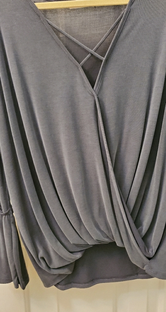 Bell sleeves, gray blouse